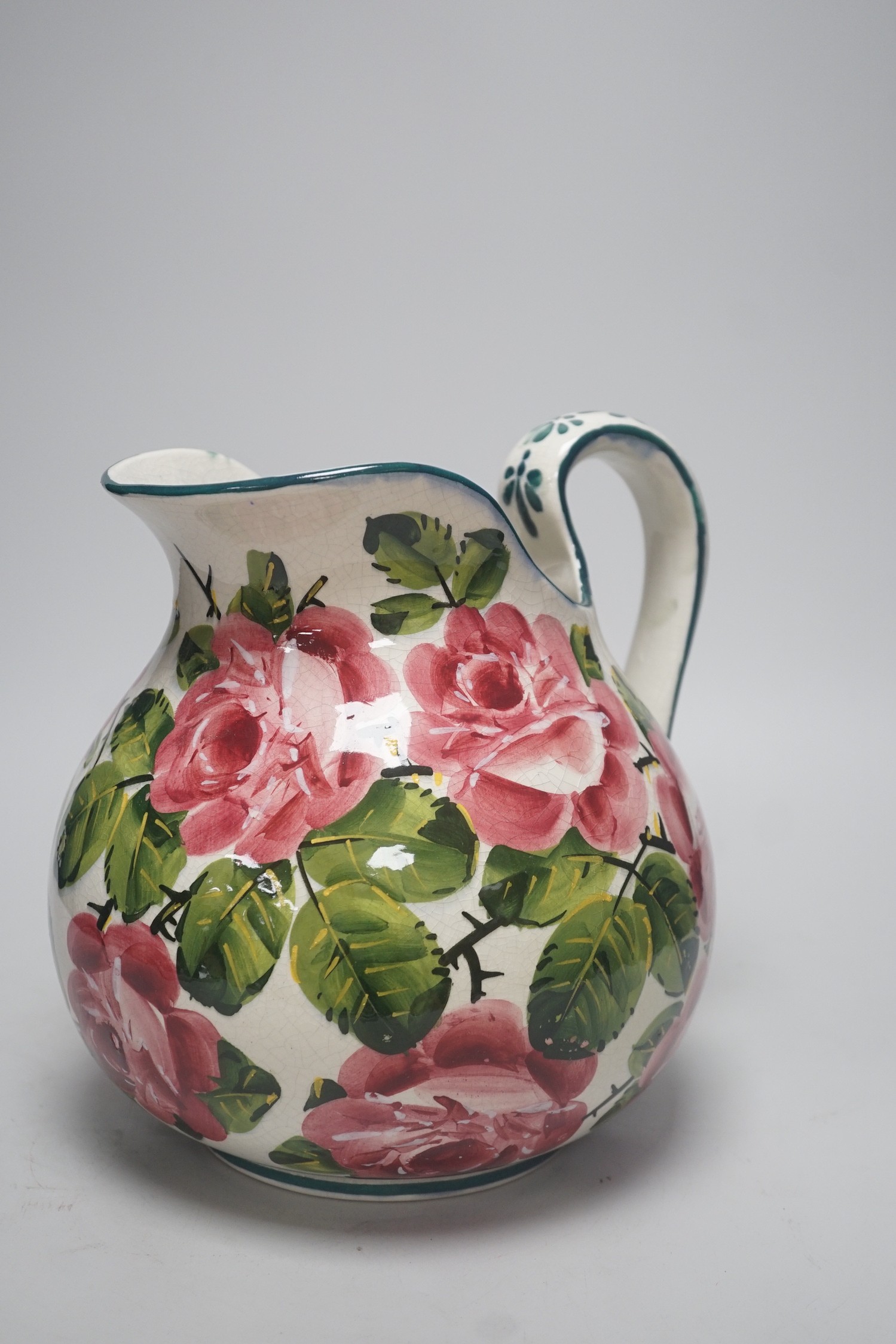 A Wemyss ‘cabbage roses’ pattern ewer, painted Wemyss mark to base. 26cm tall